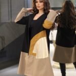 جاكيت أسود وبيج بلمسة ذهبية